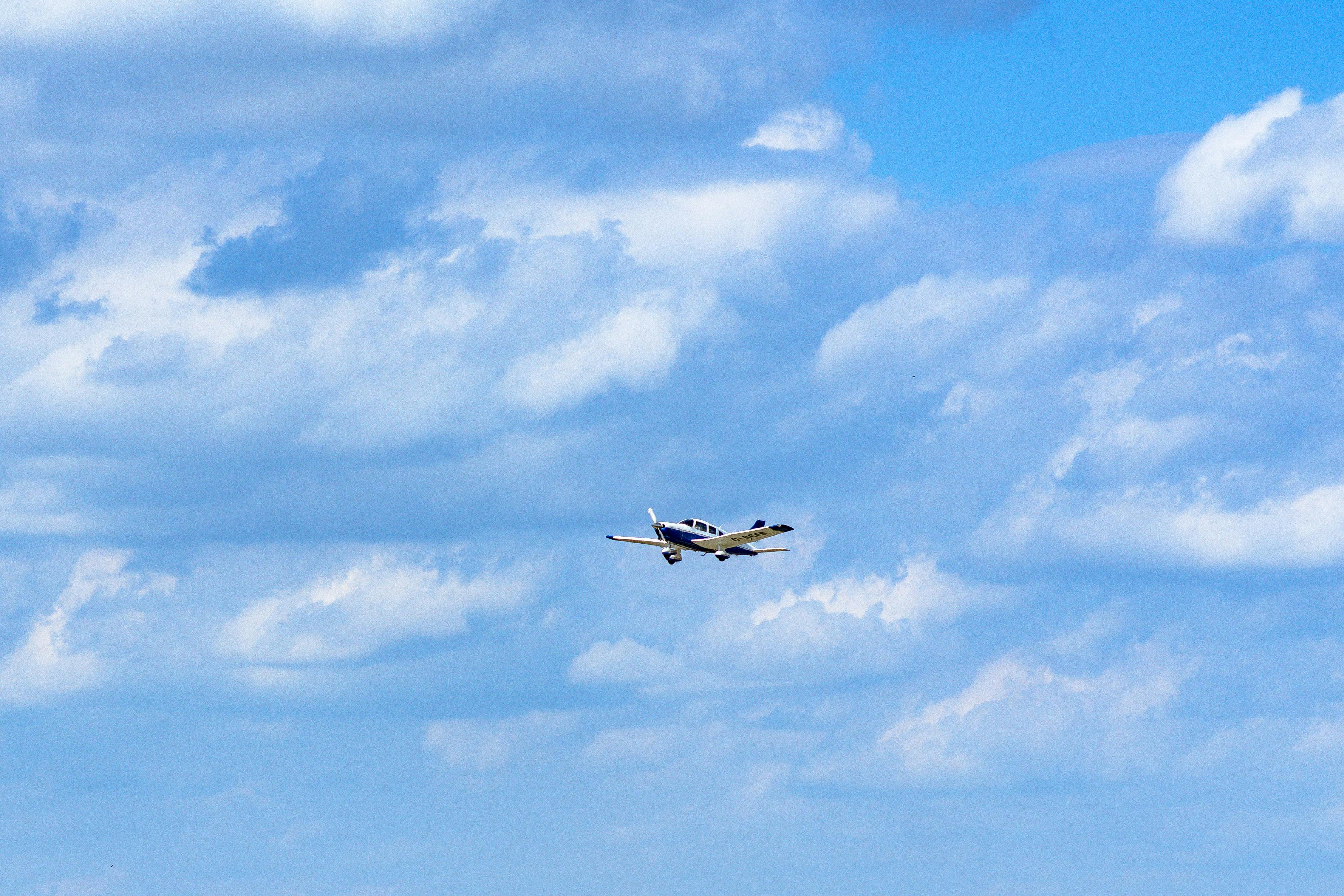 Airplane above clouds